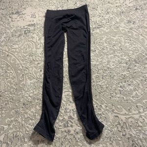 2 pairs of size small textured leggings